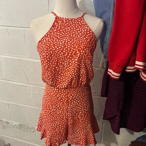 She & Sky romper in orange and white